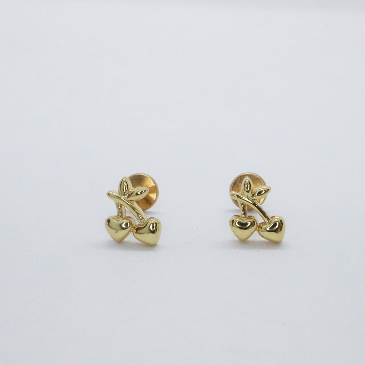 Adorable gold fruit earrings with push pin closure