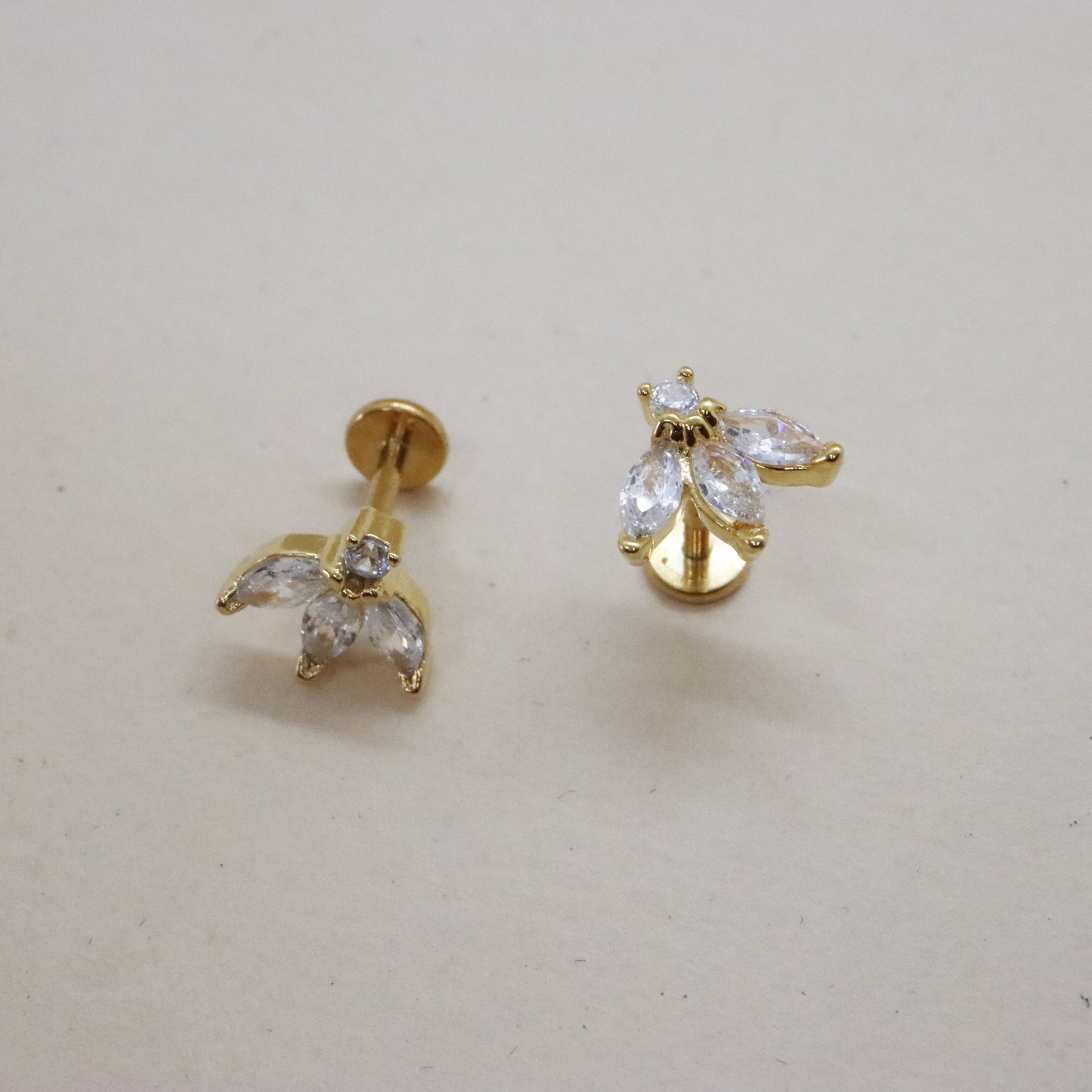 Charming floral-inspired gold push pin earrings