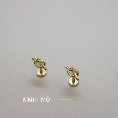 Chic gold love knot earrings with a minimalist style