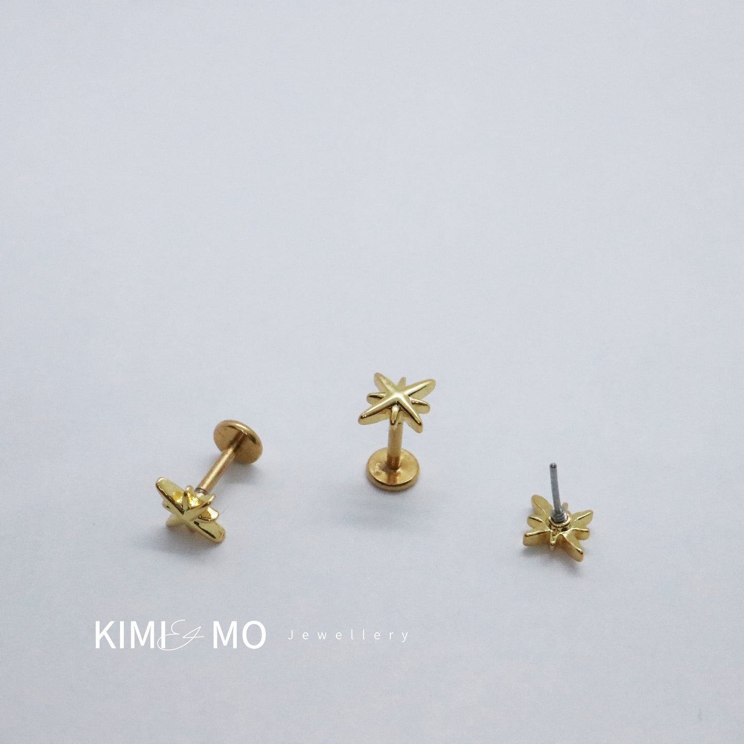 Elegant gold celestial earrings with sparkling push pin