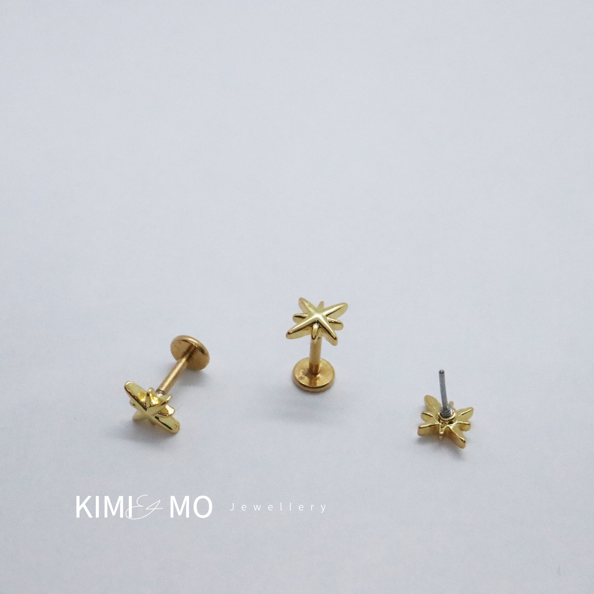 Elegant gold celestial earrings with sparkling push pin