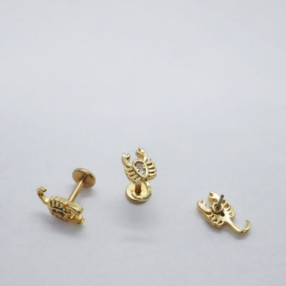 Elegant gold zodiac scorpion earrings with crystal accents