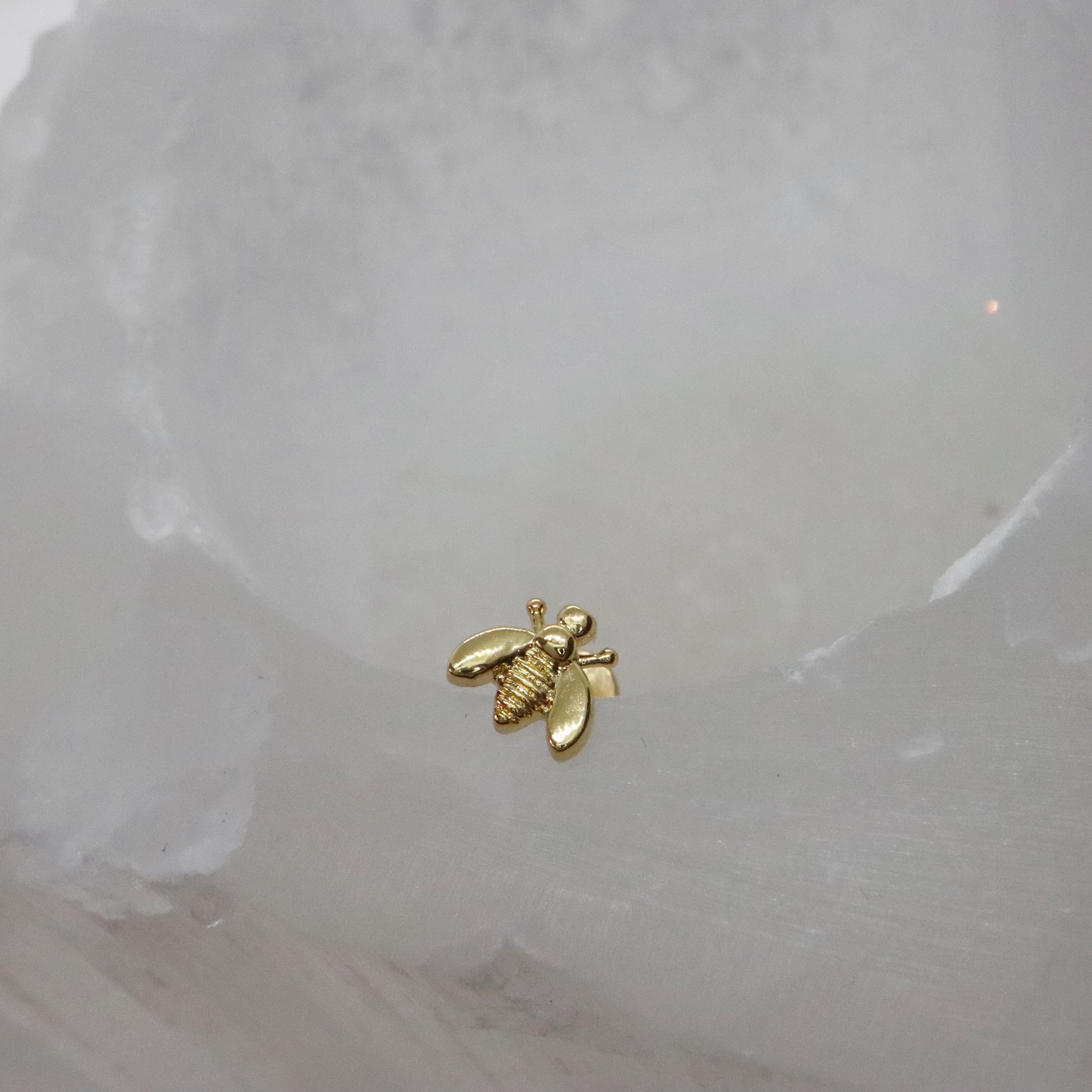 Fashion-forward gold bee earrings for stylish looks