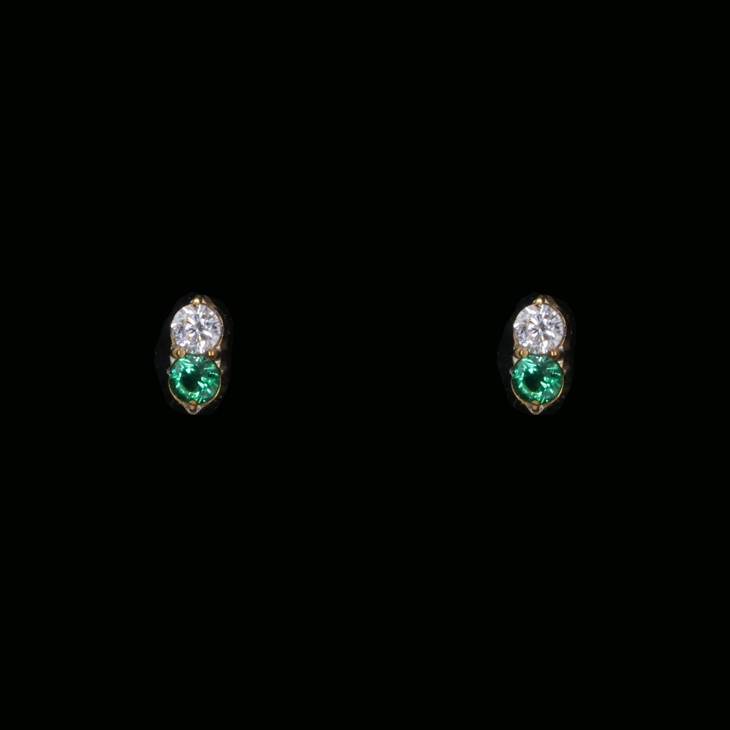 Fashionable gold push pin earrings with green and clear gemstones