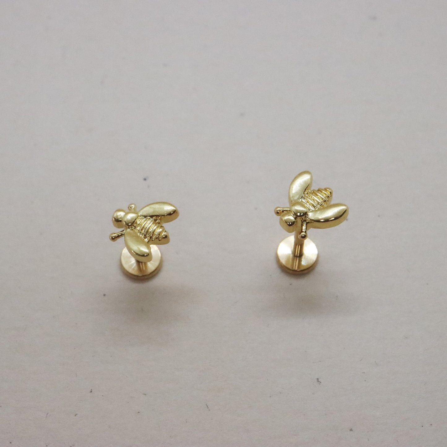 Gold bee motif flat back stud earrings