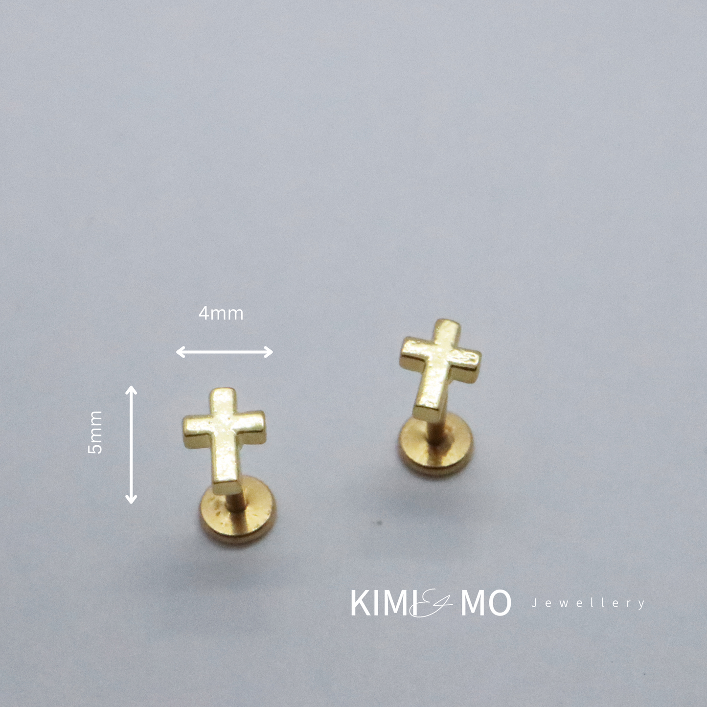 Gold cross stud earrings with a matte finish