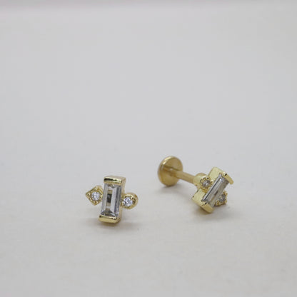 Gold flat back earrings with bar design and diamond accents