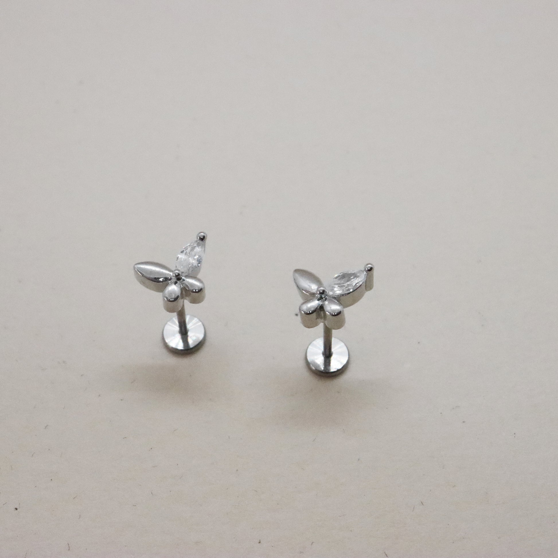 Timeless threadless butterfly earrings with crystal detailing