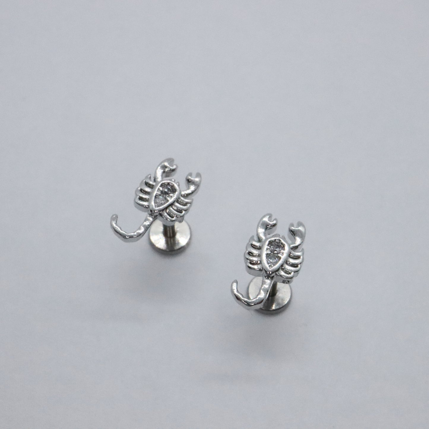 trendy-silver-scorpion-stud-earrings-hint-sparkle