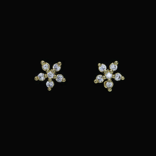 Versatile gold floral stud earrings with a touch of sparkle